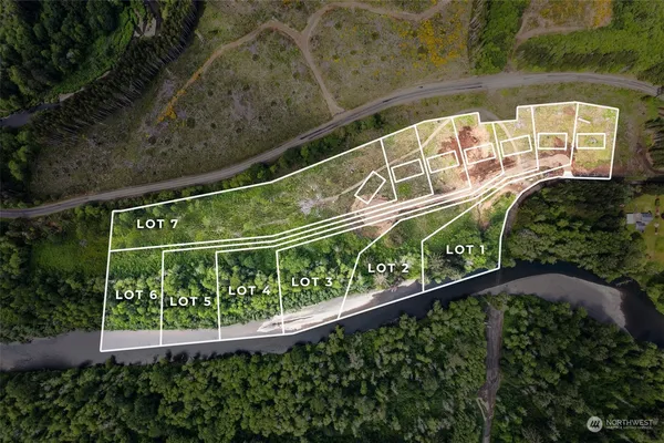 a view of a balcony with a yard