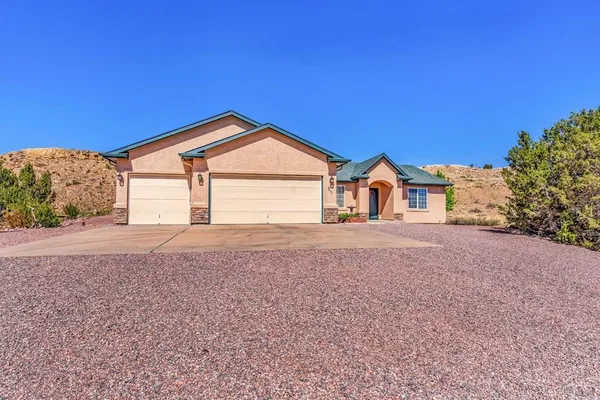 a very nice looking house with a big yard
