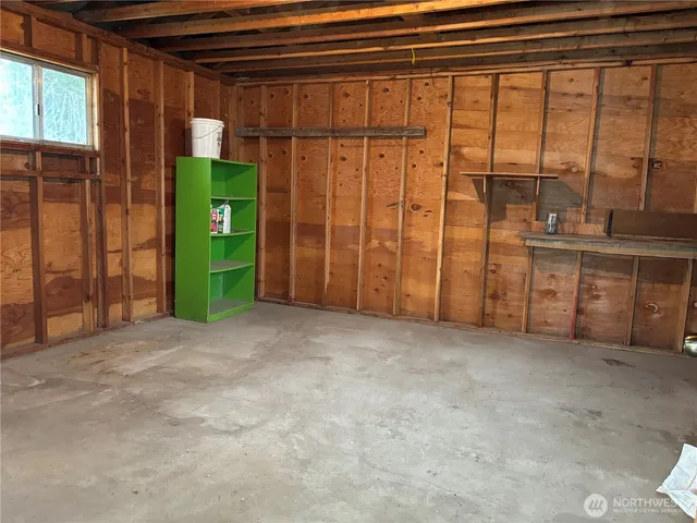 a view of a room with window and cabinet