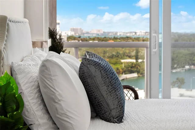 a view of a balcony with lake view and mountain view