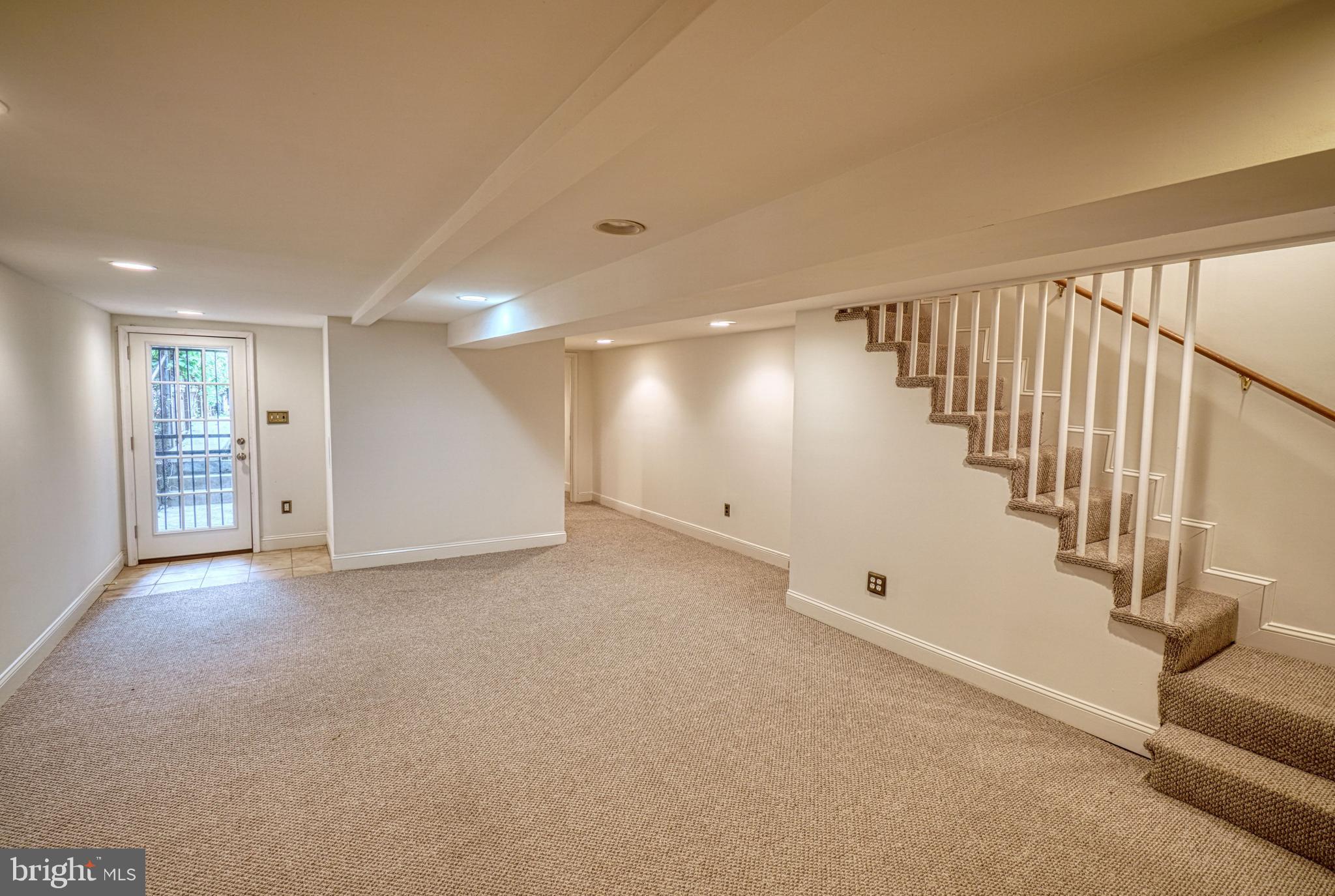1821 Kilbourne Place Northwest Washington, DC 20010 - Photo 27 of 40 a view of an empty room with stairs