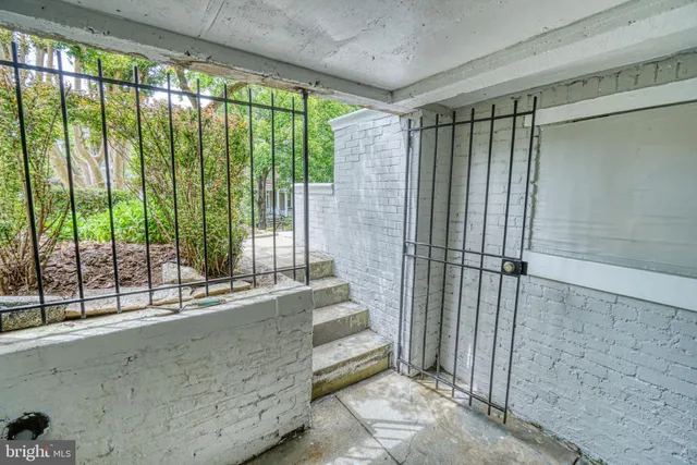a view of balcony with furniture