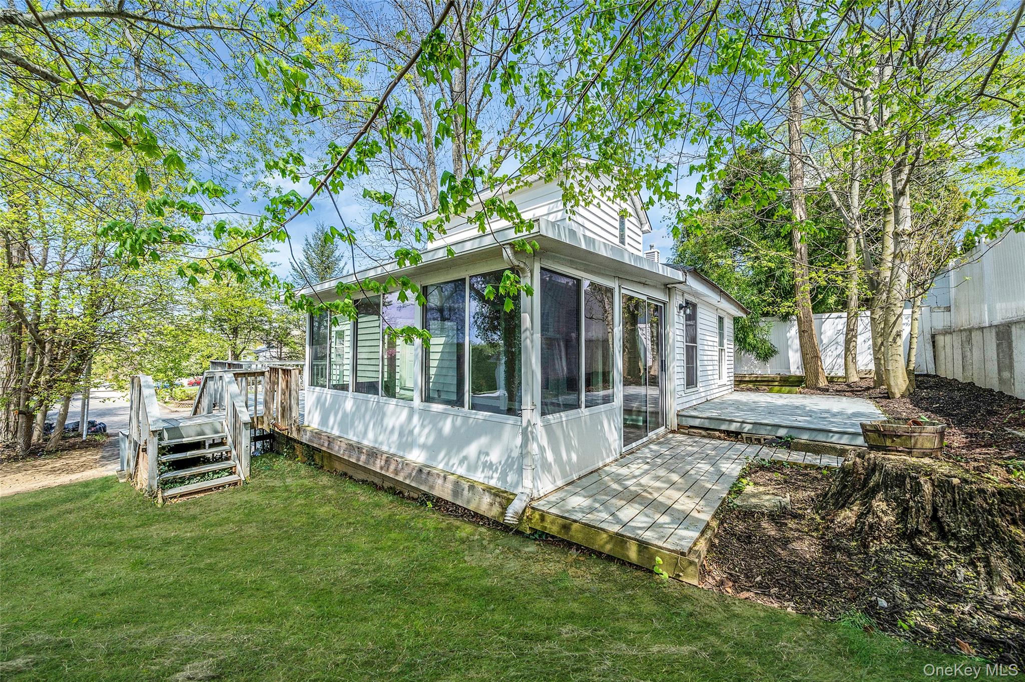 93 Maple Road Kings Park, NY 11754 - Photo 6 of 24 a view of a house with backyard and sitting area