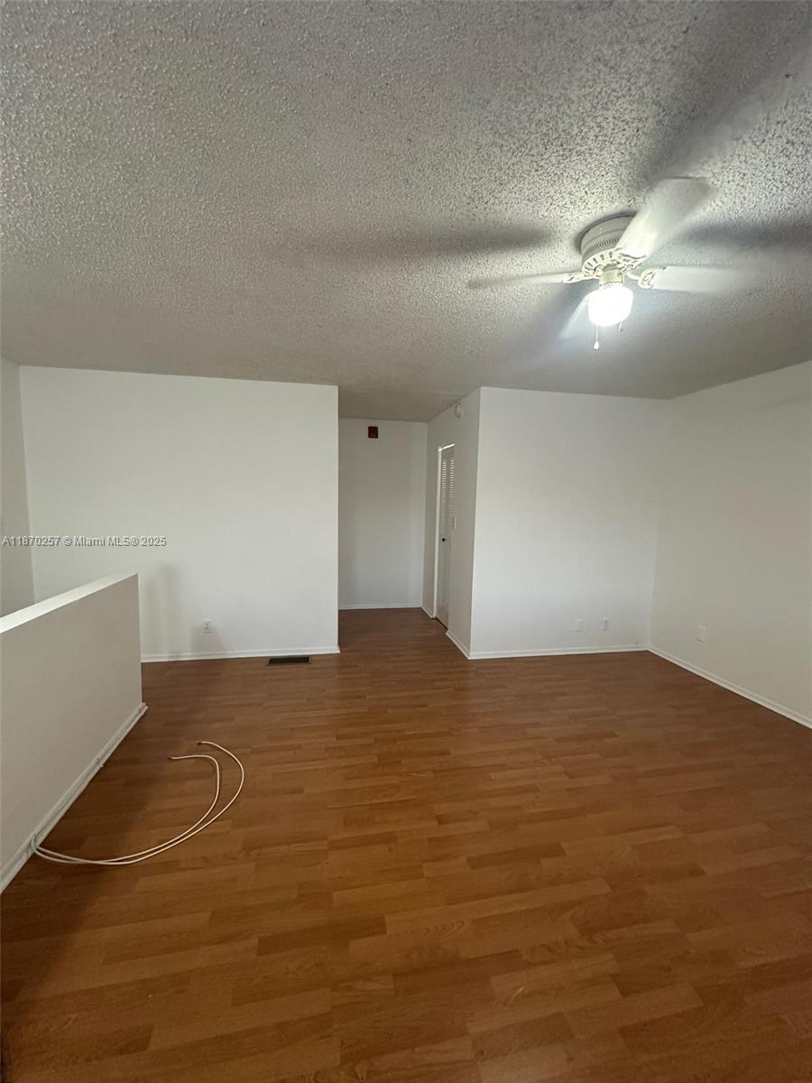 17911 Northwest 68th Avenue, Unit N206 Hialeah, FL 33015 - Photo 6 of 10 a view of empty room
