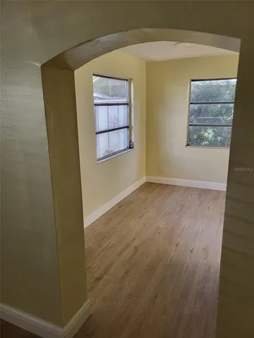 an empty room with windows
