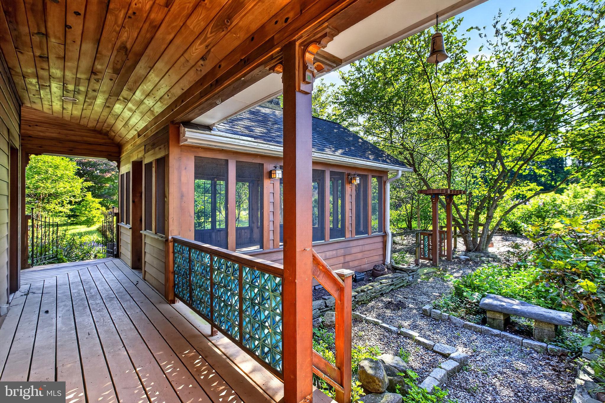 498 Perrineville Road Robbinsville, NJ 08691 - Photo 43 of 59 a view of a porch with wooden floor and outdoor space