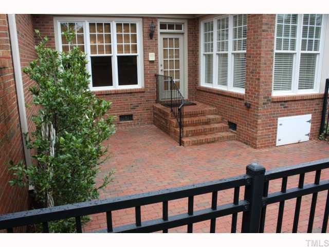 1821 Middlebrook Drive Raleigh, NC 27615 - Photo 10 of 12 a front view of a house with a yard