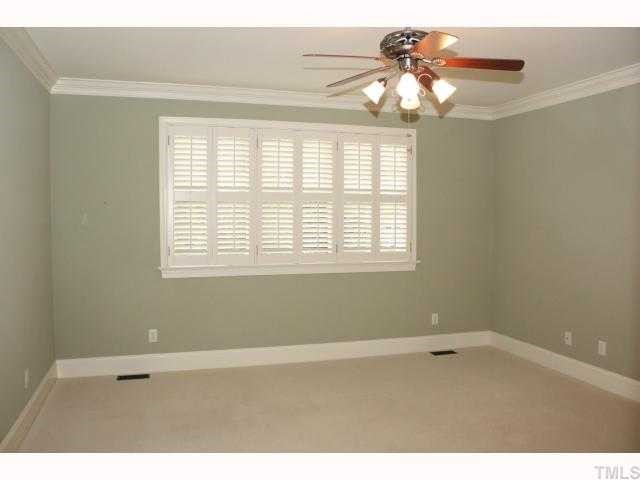 1821 Middlebrook Drive Raleigh, NC 27615 - Photo 4 of 12 a view of an empty room with a window