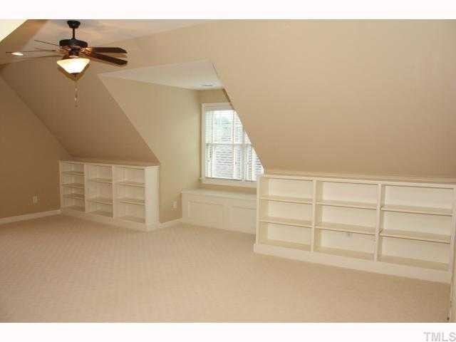 1821 Middlebrook Drive Raleigh, NC 27615 - Photo 8 of 12 a view of an empty room with a window