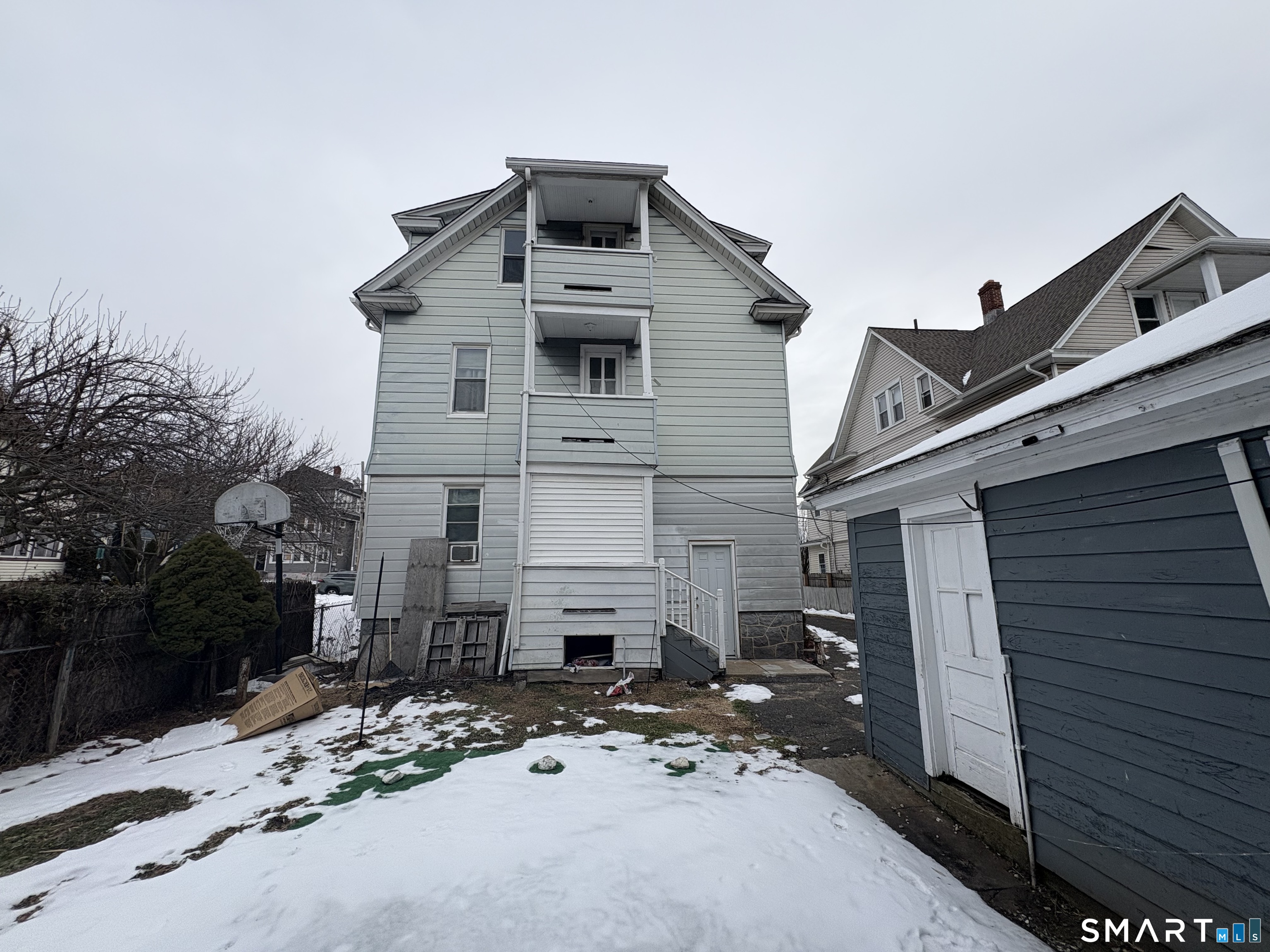 67 Kent Avenue Bridgeport, CT 06610 - Photo 5 of 11 a view of a house with a yard
