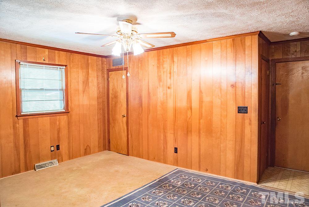 2900 Dink Ashley Road Timberlake, NC 27583 - Photo 4 of 15 a bedroom with a bed and a window