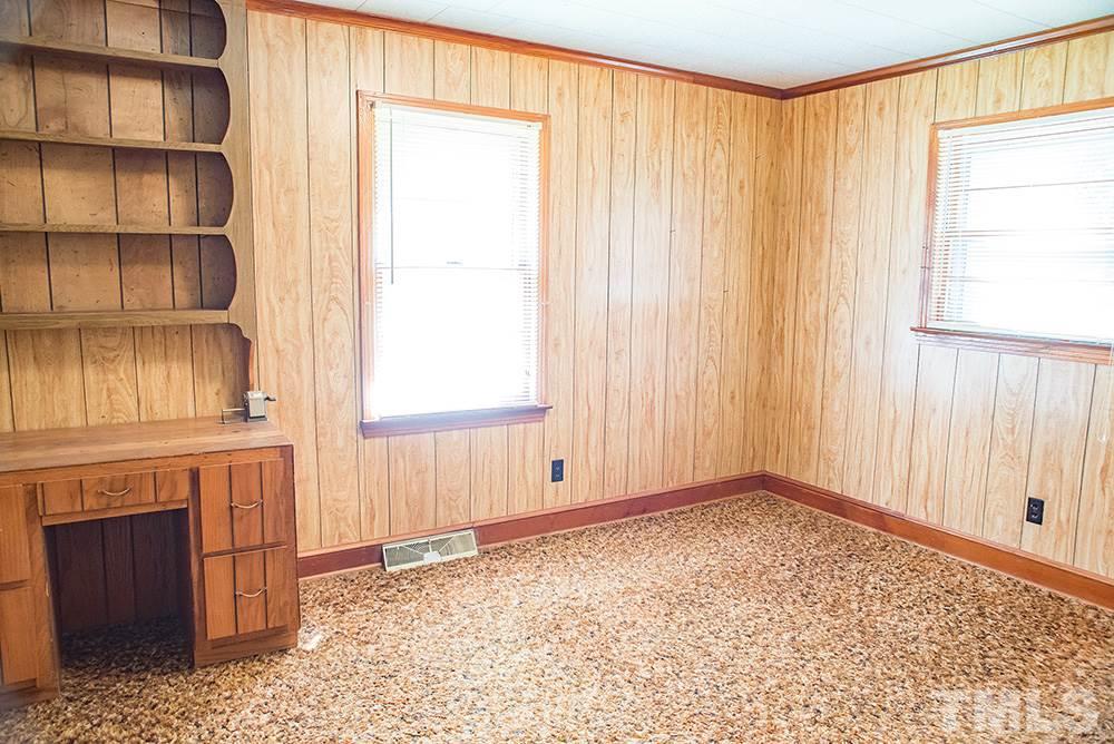2900 Dink Ashley Road Timberlake, NC 27583 - Photo 8 of 15 a view of an empty room with a window