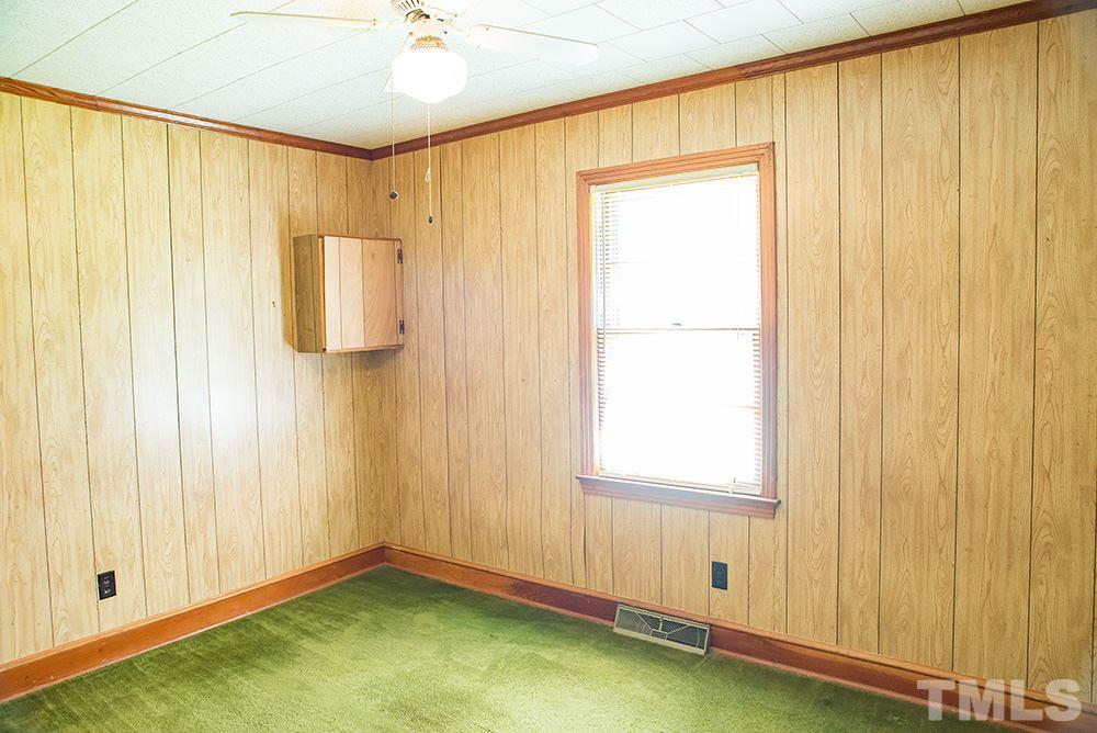 2900 Dink Ashley Road Timberlake, NC 27583 - Photo 9 of 15 a view of an empty room with a window