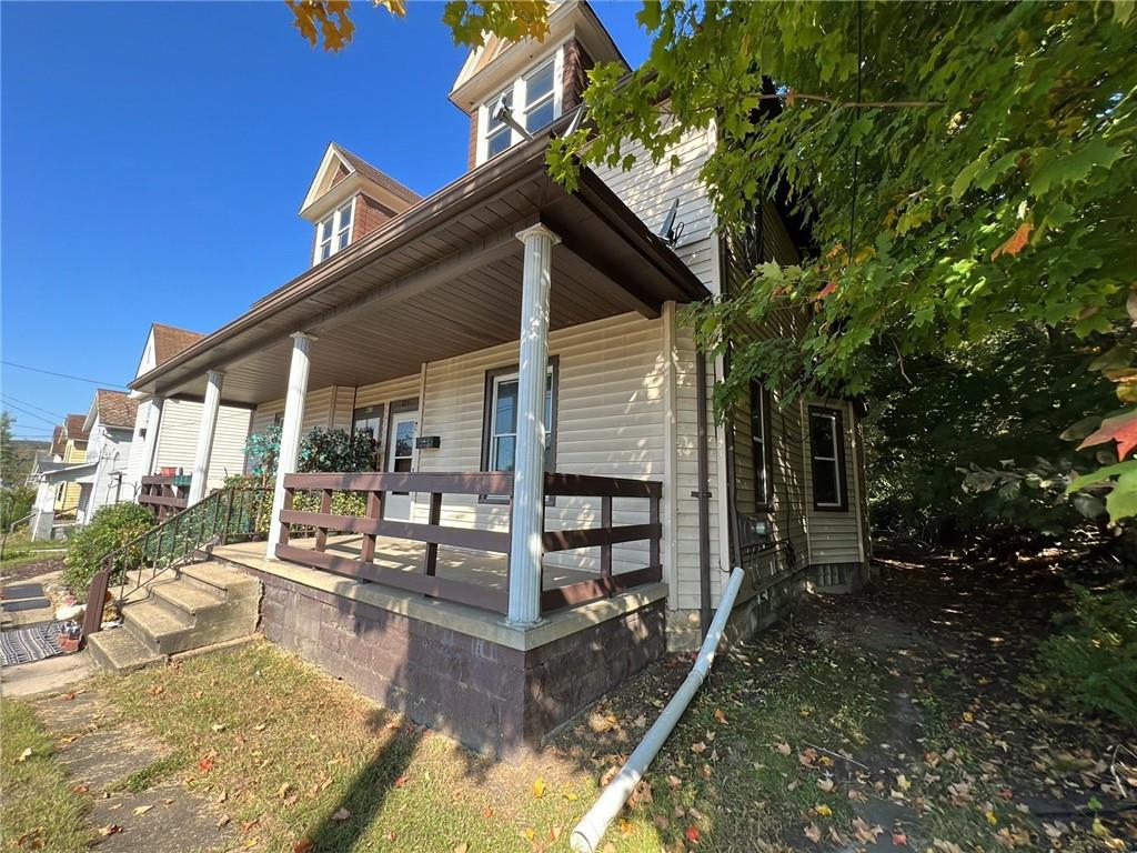 425 East Reynolds Street New Castle, PA 16101 - Photo 11 of 13 a view of a house with backyard and sitting area