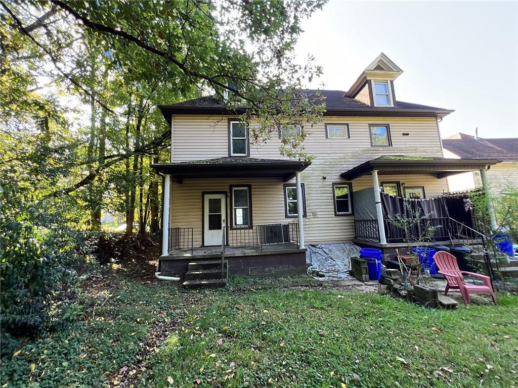 425 East Reynolds Street New Castle, PA 16101 - Photo 13 of 13 a front view of a house with garden