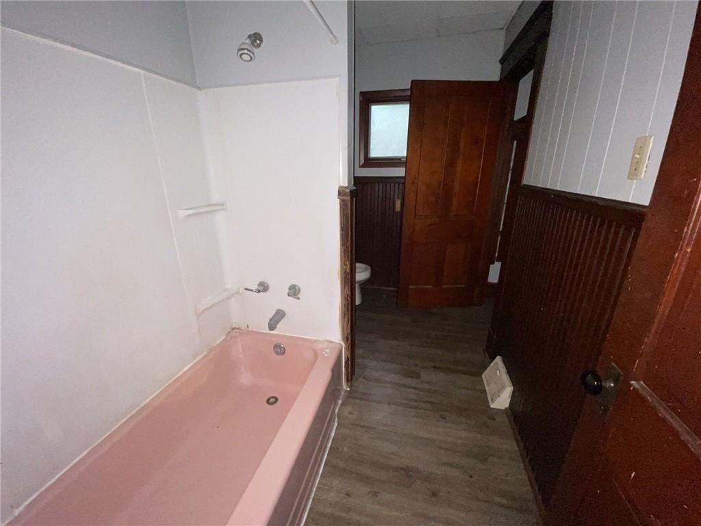 425 East Reynolds Street New Castle, PA 16101 - Photo 6 of 13 a bathroom with a bathtub and shower