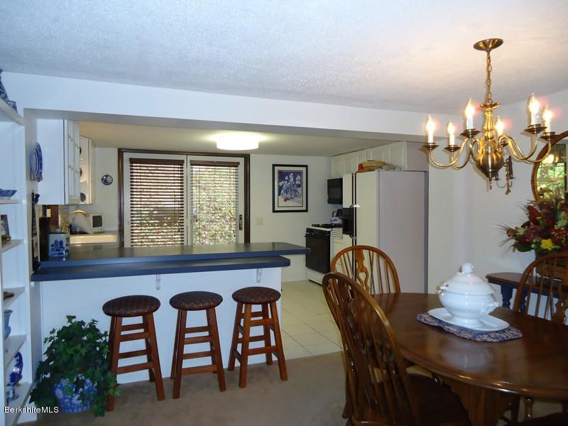 2359 North Main Road Otis, MA 01253 - Photo 17 of 32 a dining room with furniture and window