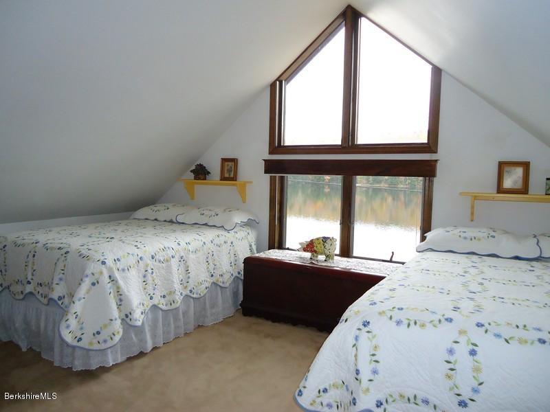 2359 North Main Road Otis, MA 01253 - Photo 22 of 32 a bedroom with bed and window