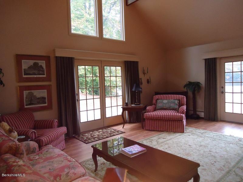 2359 North Main Road Otis, MA 01253 - Photo 26 of 32 a living room with furniture and a window