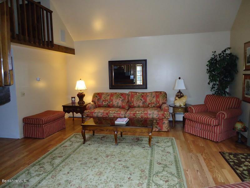 2359 North Main Road Otis, MA 01253 - Photo 29 of 32 a living room with furniture and a potted plant