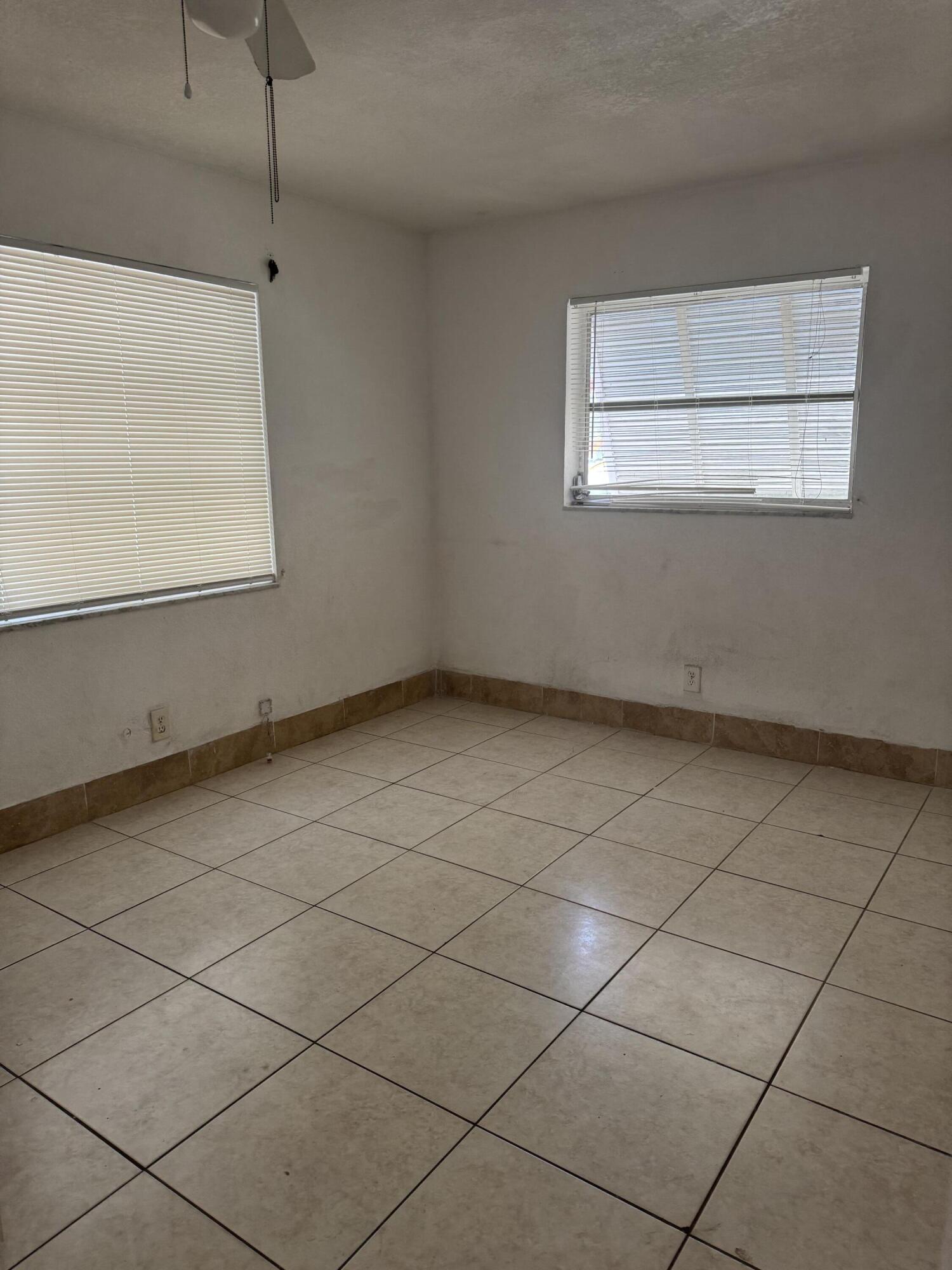 3500 Riverside Drive, Unit 13 Coral Springs, FL 33065 - Photo 13 of 15 a view of room and window