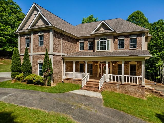 1190 Maple Grove Road Morganton, GA 30560 - Photo 14 of 96 a front view of a house with a yard