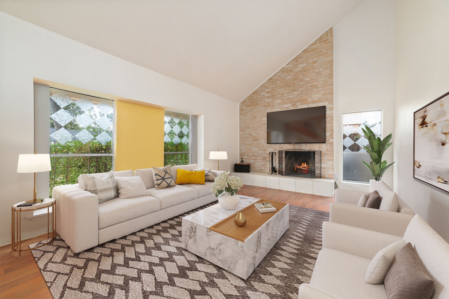 a living room with furniture and a fireplace