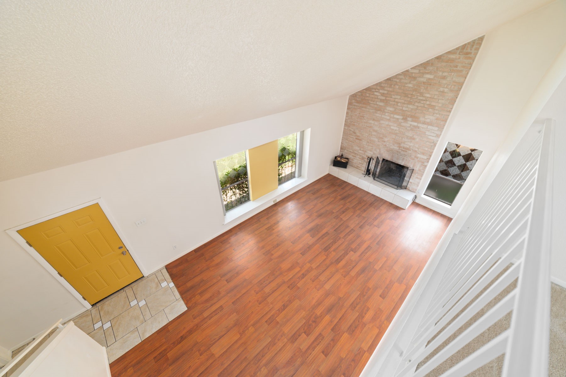 25402 Mill Pond Lane Spring, TX 77373 - Photo 17 of 22 a view of an empty room with wooden floor and a window