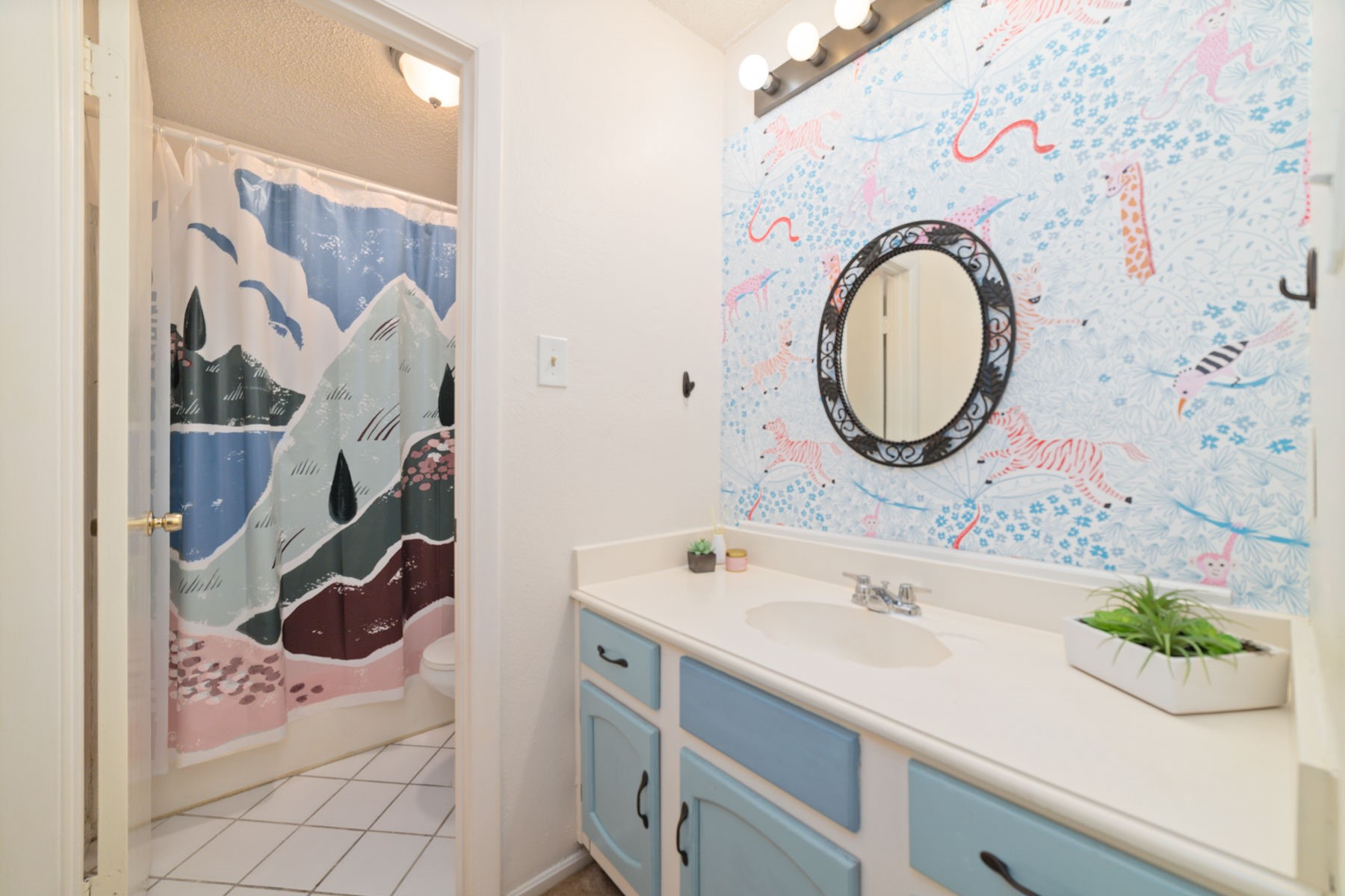 25402 Mill Pond Lane Spring, TX 77373 - Photo 18 of 22 a bathroom with a sink and a mirror