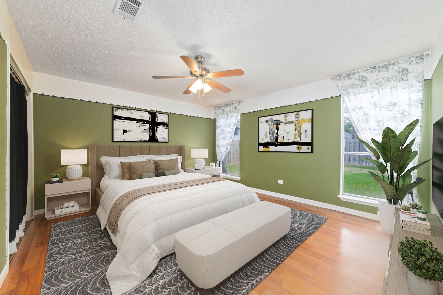 25402 Mill Pond Lane Spring, TX 77373 - Photo 8 of 22 a bedroom with a large bed and a potted plant