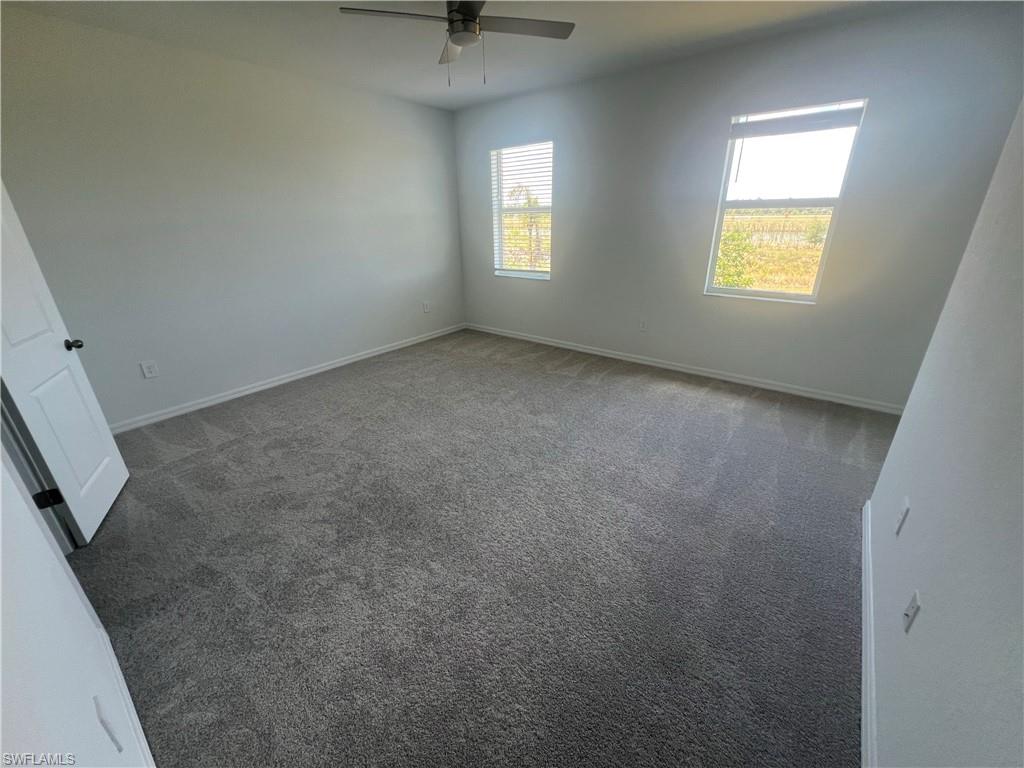 2971 Citrus Street Naples, FL 34120 - Photo 15 of 42 an empty room with a window