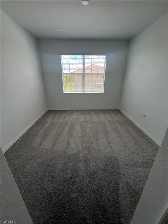 2971 Citrus Street Naples, FL 34120 - Photo 21 of 42 an empty room with a window