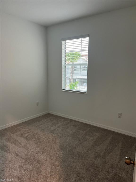 2971 Citrus Street Naples, FL 34120 - Photo 22 of 42 an empty room with a window