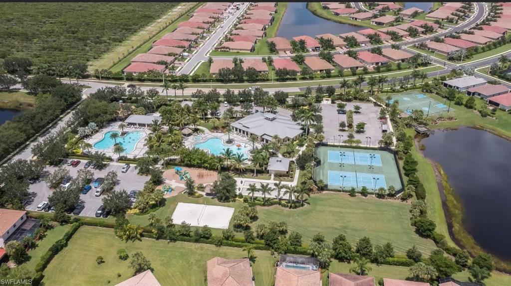 2971 Citrus Street Naples, FL 34120 - Photo 29 of 42 an aerial view of residential houses with outdoor space