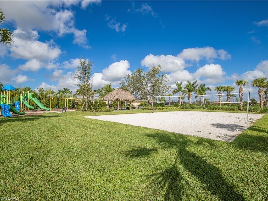 2971 Citrus Street Naples, FL 34120 - Photo 30 of 42 a view of a golf course with a fountain