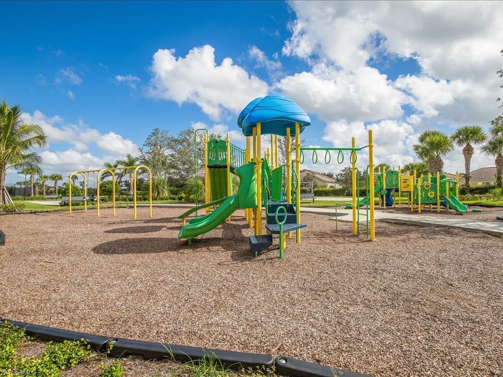 2971 Citrus Street Naples, FL 34120 - Photo 31 of 42 a view of a park with swings and slides