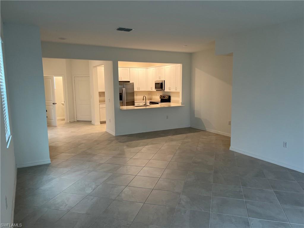 2971 Citrus Street Naples, FL 34120 - Photo 41 of 42 an empty room with a bathroom