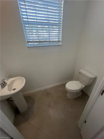 a kitchen with stainless steel appliances a refrigerator sink and stove