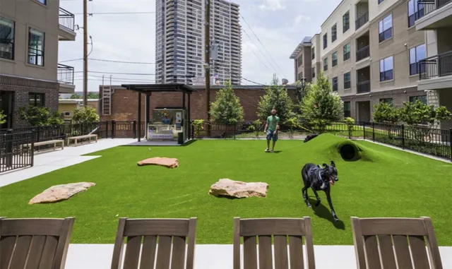 a front view of a building with garden