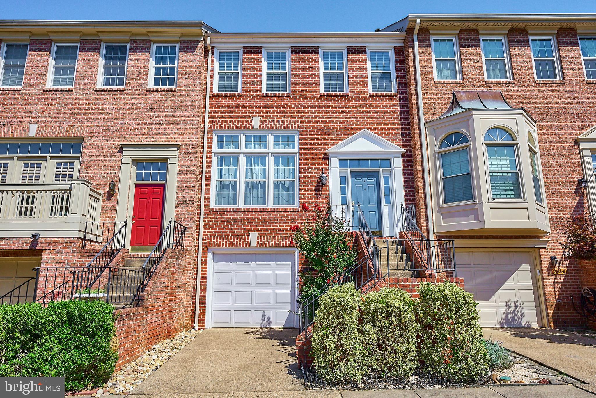 20340 Brentmeade Terrace Sterling, VA 20165 - Photo 1 of 43 front view of a house