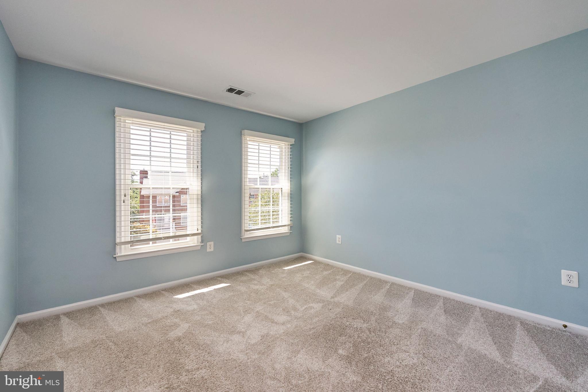 20340 Brentmeade Terrace Sterling, VA 20165 - Photo 17 of 43 a view of an empty room with a window