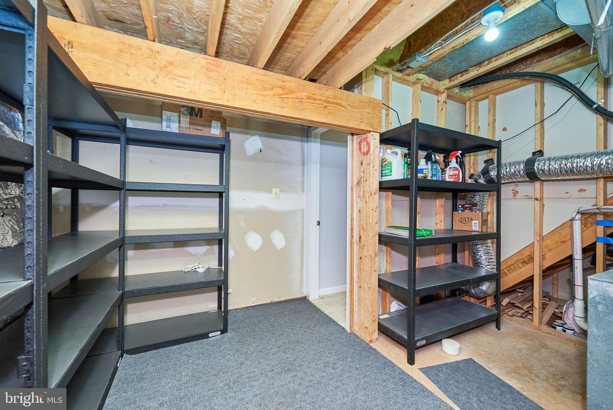 20340 Brentmeade Terrace Sterling, VA 20165 - Photo 29 of 43 a view of store room with racks