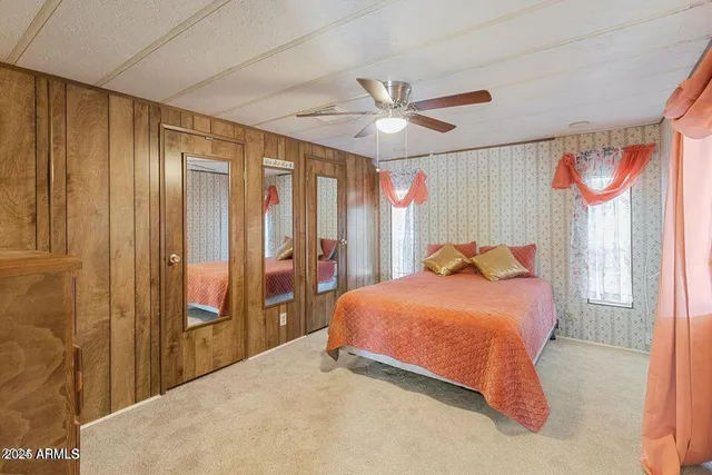 a kitchen with a stove a sink and a refrigerator