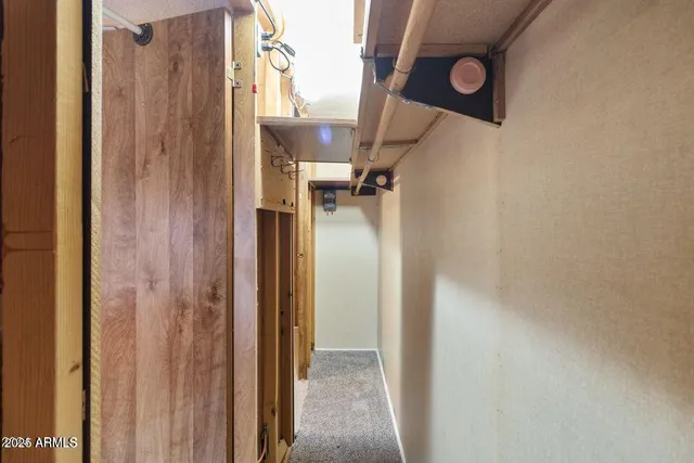 a living room with a couch and a window