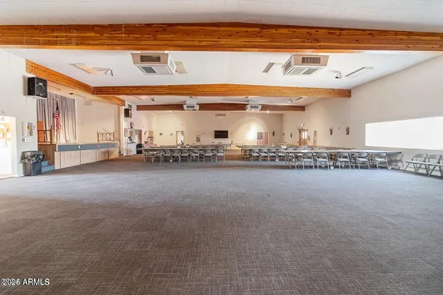 a view of a living room with a swimming pool