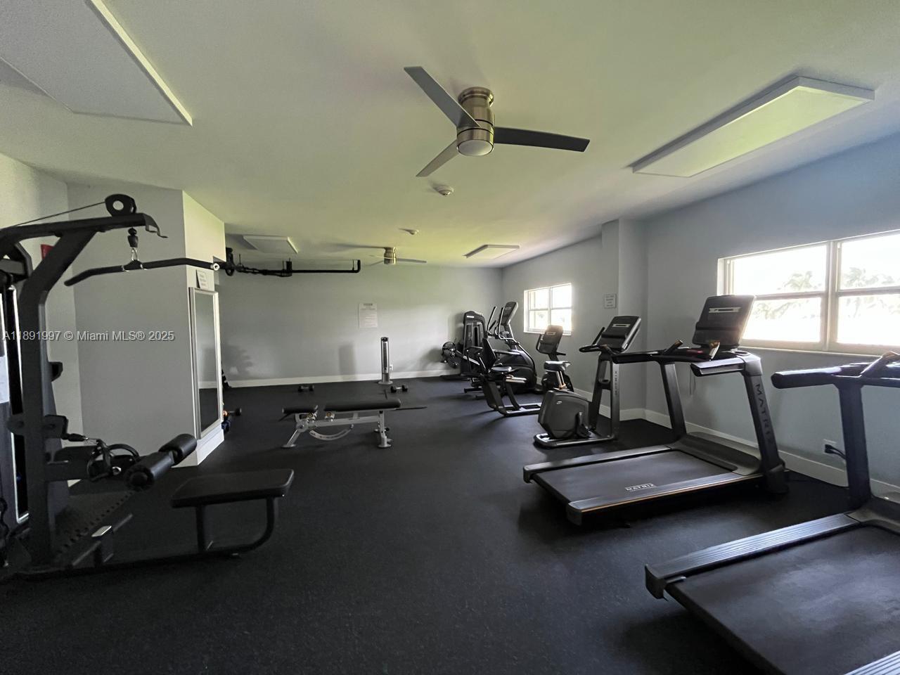 750 North Ocean Boulevard, Unit 905 Pompano Beach, FL 33062 - Photo 28 of 29 a view of a room with gym equipment