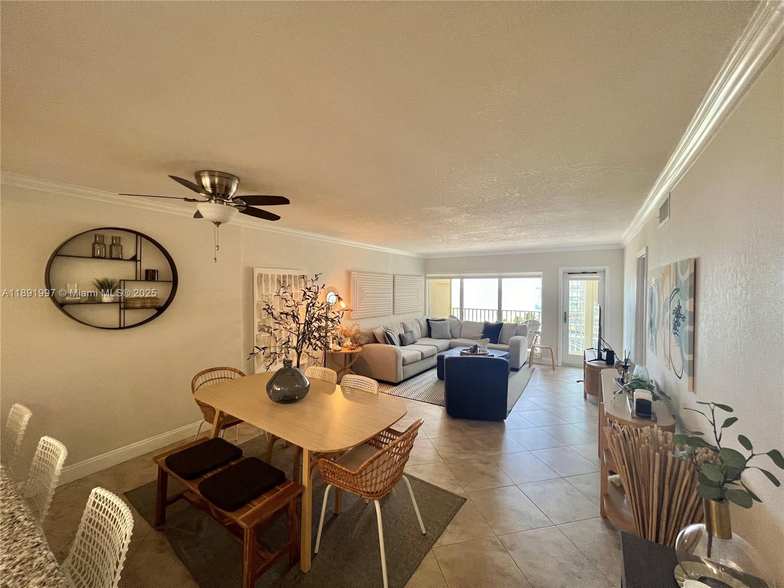 750 North Ocean Boulevard, Unit 905 Pompano Beach, FL 33062 - Photo 9 of 29 a view of a dining room with furniture