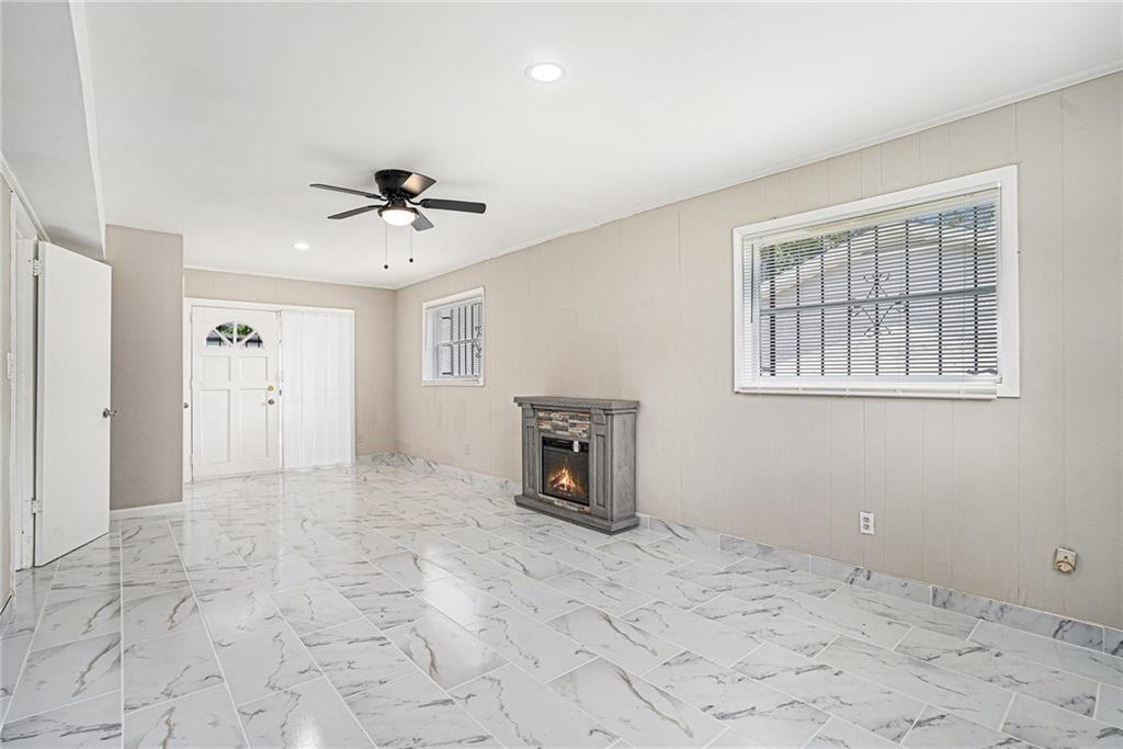 2403 Tiffany Place Decatur, GA 30035 - Photo 17 of 29 a view of an empty room with a fireplace