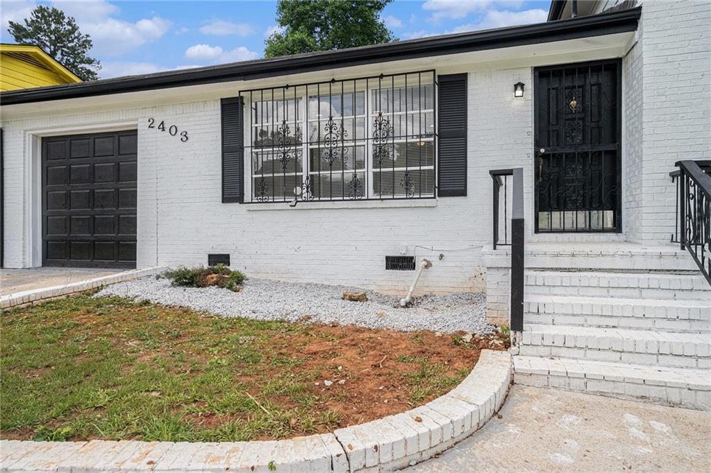 2403 Tiffany Place Decatur, GA 30035 - Photo 5 of 29 a view of a house with wooden fence