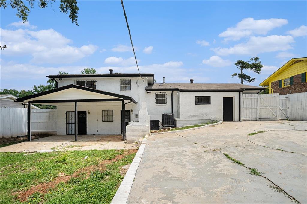 2403 Tiffany Place Decatur, GA 30035 - Photo 7 of 29 a house view with a garden space